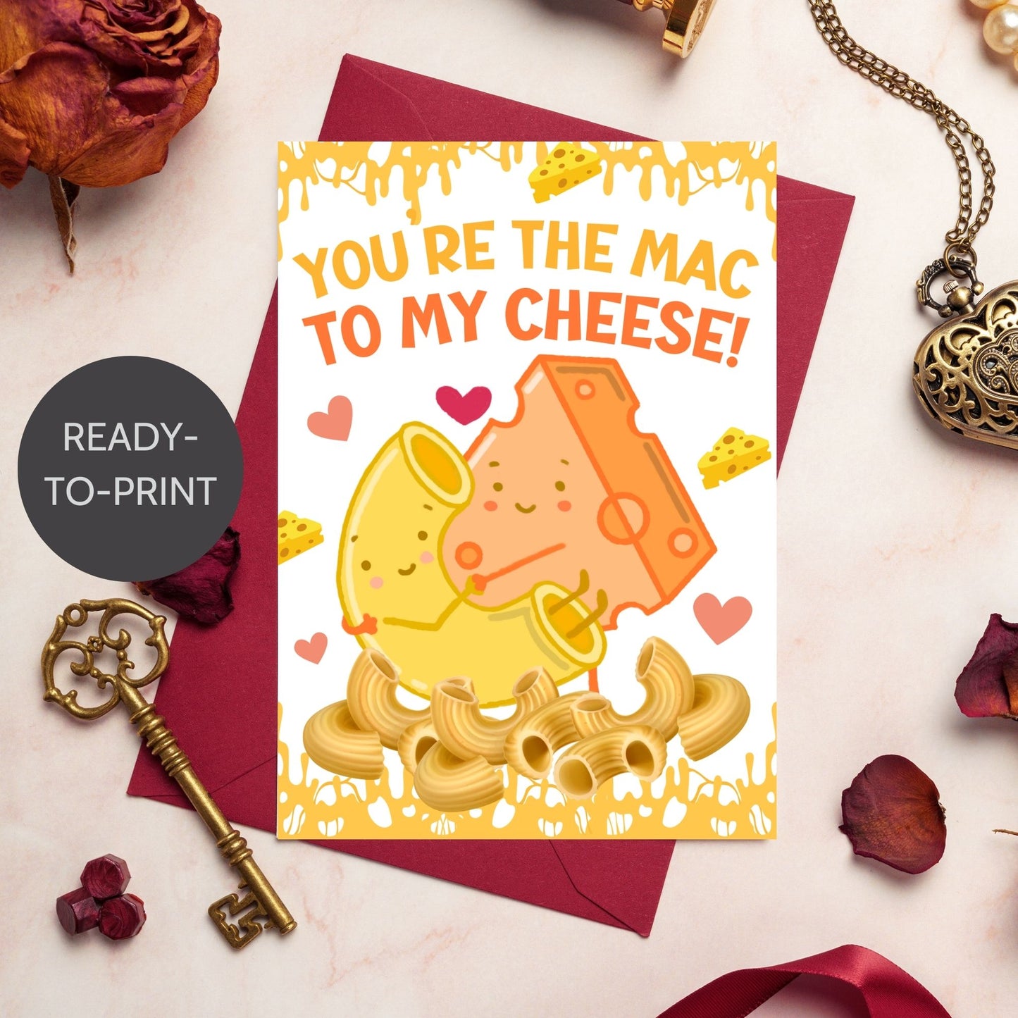 Printable Valentineās Day Greeting Card featuring the phrase āYouāre the Mac to My Cheeseā with a mac and cheese theme. Designed as a 5x7 PDF on an 8.5 x 11 sheet with two cards per page. A fun and heartfelt Valentineās card for loved ones.