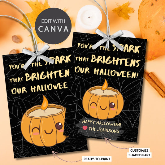 Halloween-themed printable gift tags with the message "You're the Spark that Brightens Our Halloween!" featuring a cute pumpkin candle on a black spiderweb background. Tags are 2.5 x 3.5 inches, laid out 8 per sheet on a standard 8.5 x 11-inch page. Includes a printable PDF and a PDF with a link to an editable Canva template.