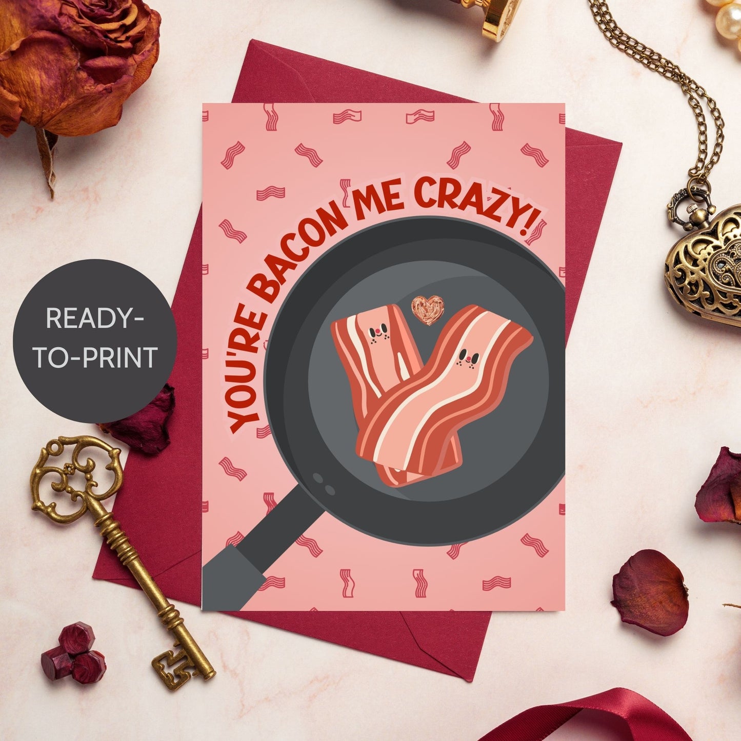 Printable Valentineās Day Greeting Card featuring the phrase āYouāre Bacon Me Crazyā with a bacon theme. Designed as a 5x7 PDF on an 8.5 x 11 sheet with two cards per page. A fun and punny Valentineās card for bacon lovers and friends.