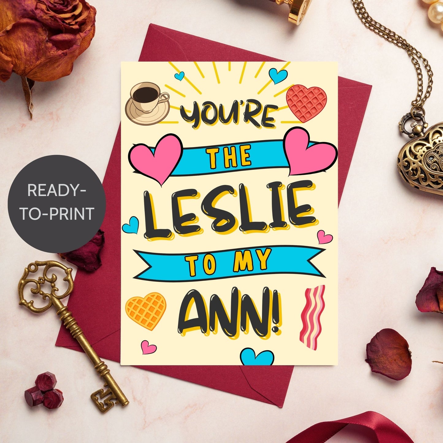 A printable Galentine’s Day greeting card featuring a Parks & Rec-inspired friendship theme, with the phrase "You’re the Leslie to My Ann." A 5x7-inch design, perfect for best friends, Galentine’s celebrations, and Parks & Rec fans, available as an instant download.