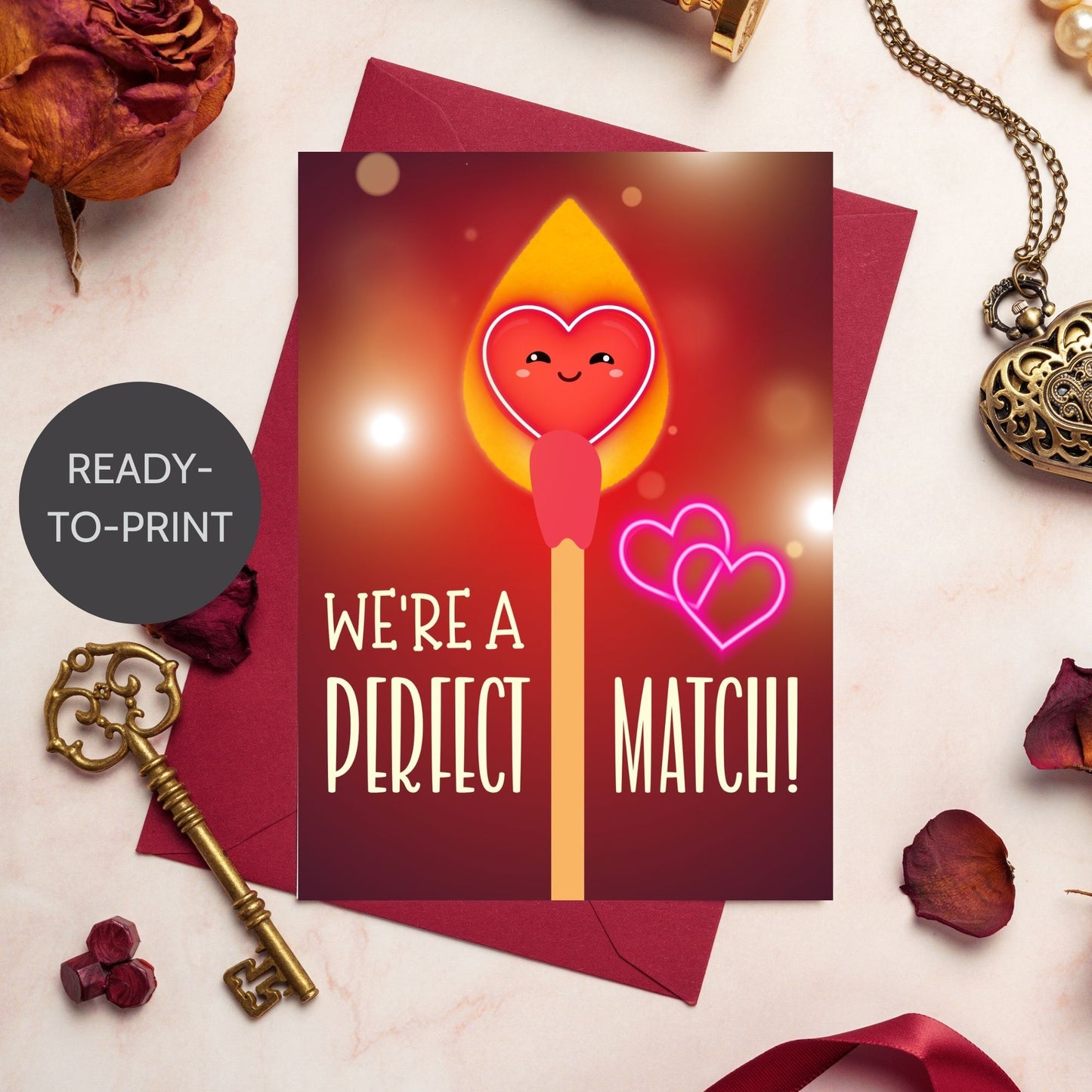 Printable Valentineās Day Greeting Card featuring the phrase āWe're a Perfect Match.ā Designed as a 5x7 PDF on an 8.5 x 11 sheet with two cards per page. A romantic and heartfelt Valentineās card for couples and loved ones.