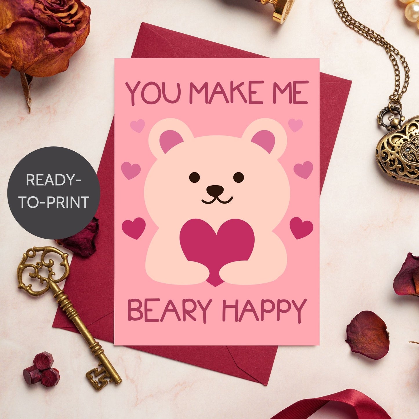 Printable Valentineās Day Greeting Card featuring the pun āYou Make Me Beary Happy.ā Designed as a 5x7 PDF on an 8.5 x 11 sheet with two cards per page. A cute and heartfelt Valentineās card for loved ones.