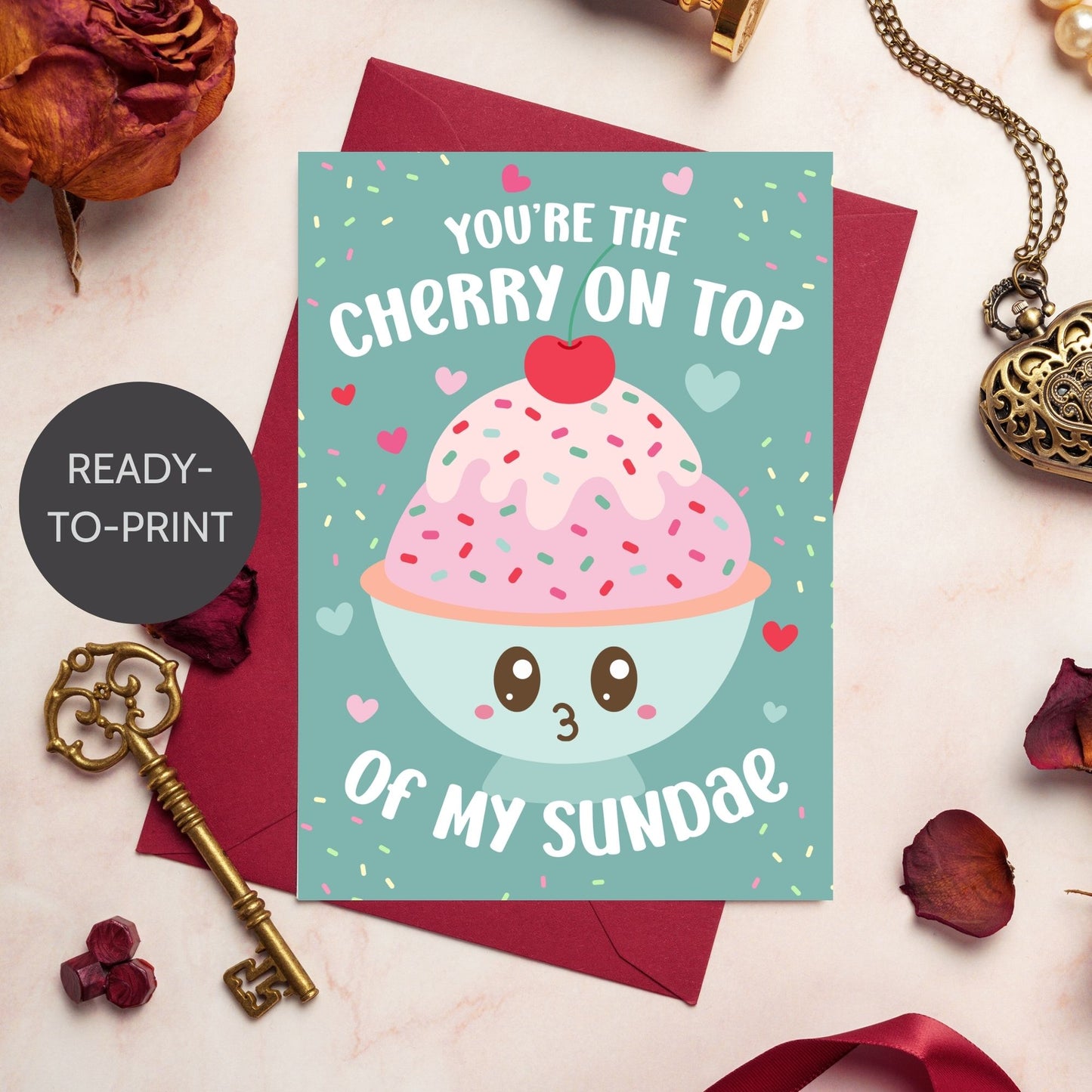Printable Valentineās Day card featuring the phrase āYouāre the Cherry on Top of My Sundaeā with a cute ice cream sundae design. Designed as a 5x7 PDF on an 8.5 x 11 sheet with two cards per page. A punny and heartfelt Valentineās card for loved ones.