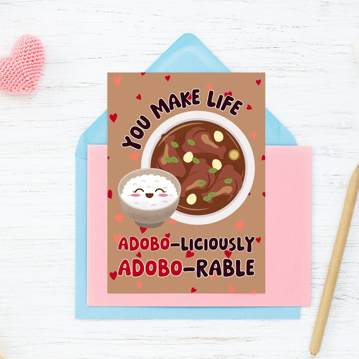 Printable Valentine’s Day card featuring the phrase “You Make Life Adoboliciously Adoborable” with a fun Adobo-themed design. Designed as a 5x7 PDF on an 8.5 x 11 sheet with two cards per page. A punny and heartfelt Valentine’s card for Filipino food lovers.