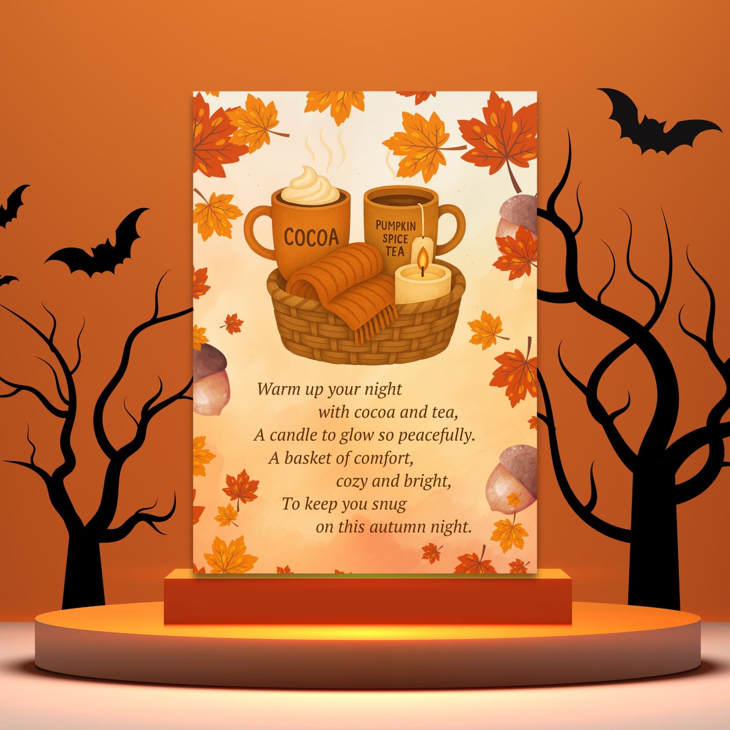 Halloween-themed product display with cocoa, pumpkin spice tea, and a basket of comfort on an orange background.