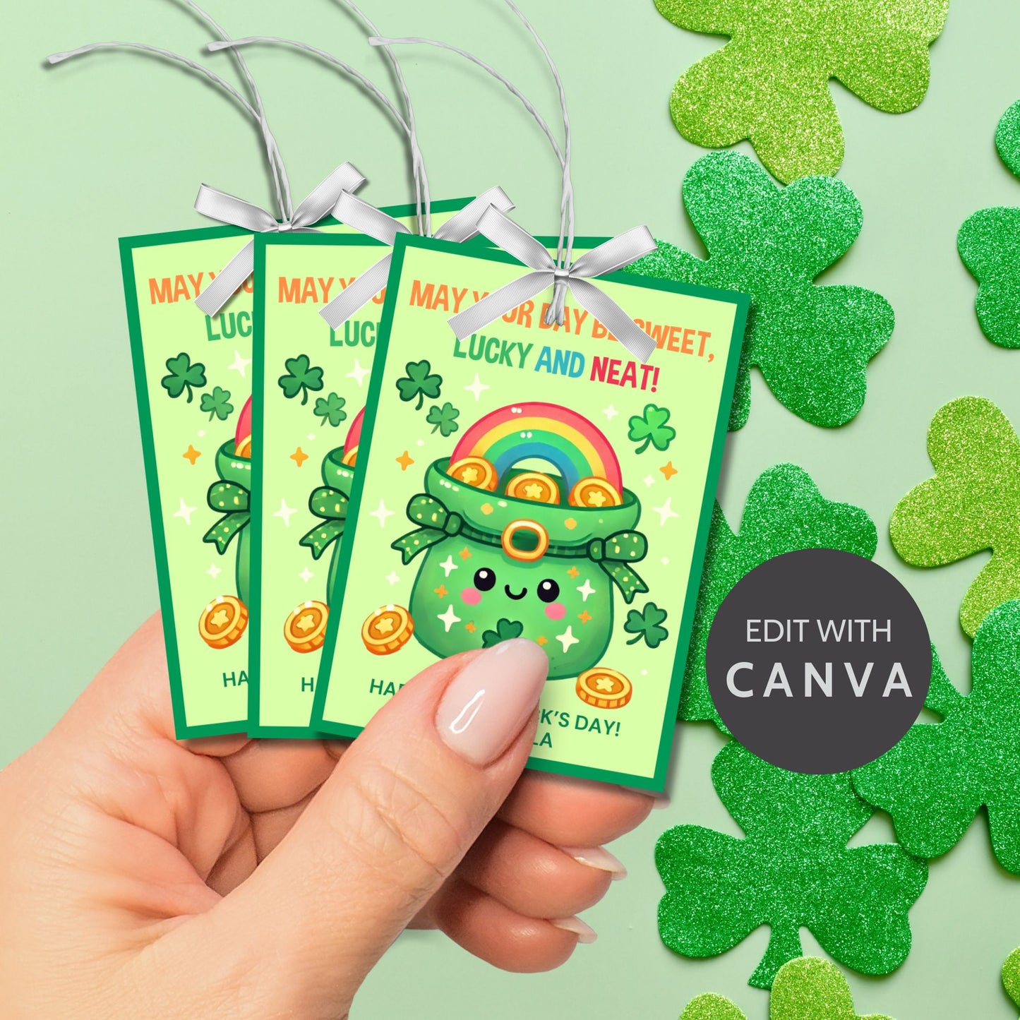 A fun and festive St. Patrick’s Day printable gift tag featuring a cute smiling pot of gold, shamrocks, and a rainbow, with the cheerful message “May Your Day Be Sweet, Lucky, and Neat!” The tags are 2.5 x 3.5 inches, laid out on an 8.5 x 11-inch sheet, 8 per page. Available as a printable PDF and an editable Canva template for personalization.