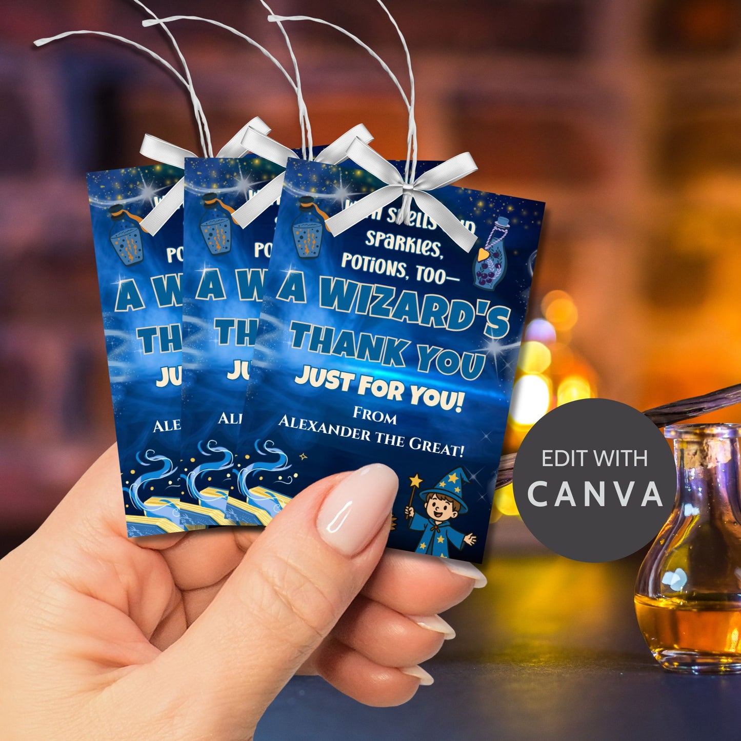 Three blue gift bags with text held by a hand, blurred background with a drink.