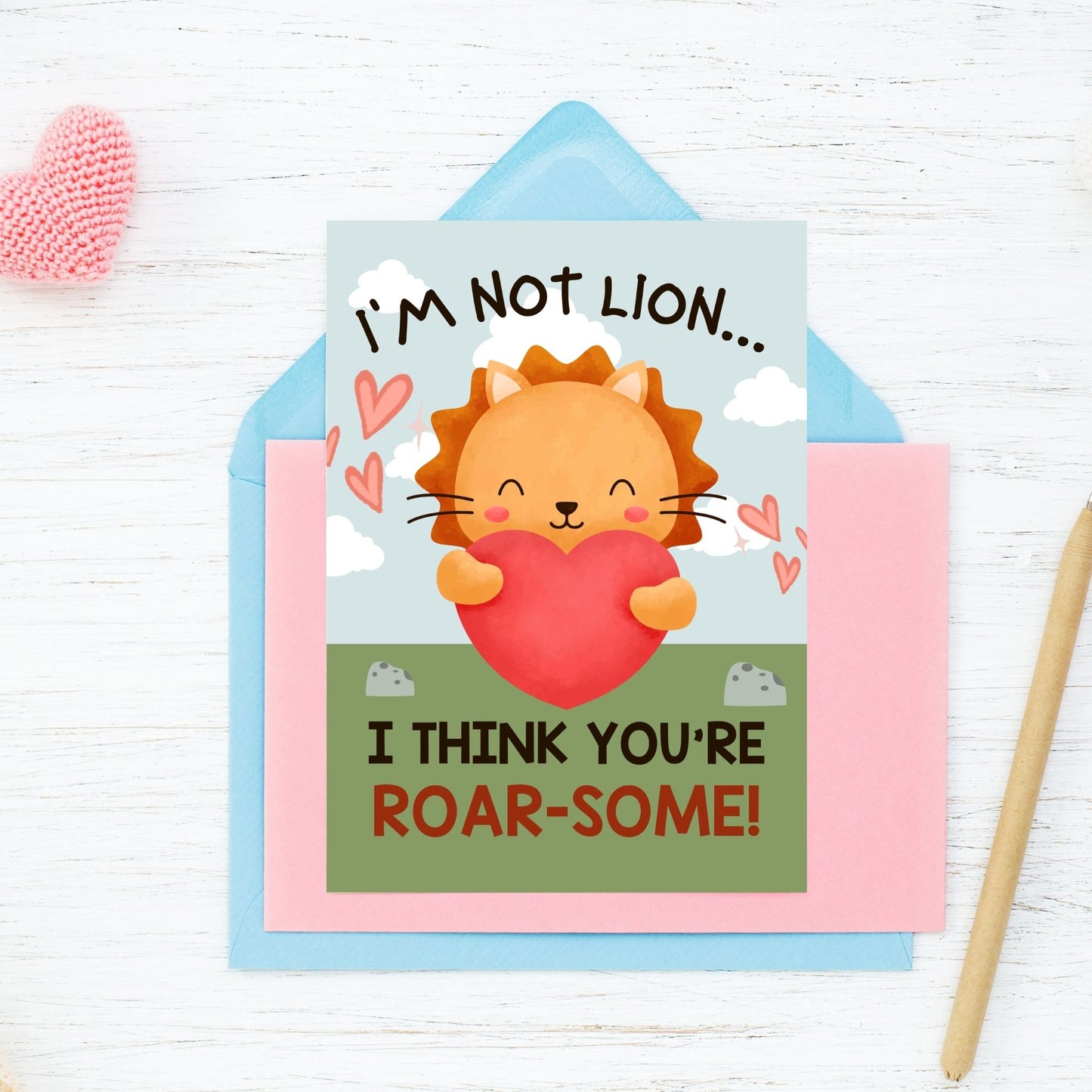 Printable Valentineās Day Greeting Card featuring the pun āIām Not Lion, I Think Youāre Roarsomeā with a lion theme. Designed as a 5x7 PDF on an 8.5 x 11 sheet with two cards per page. A fun and bold Valentineās card for animal lovers.