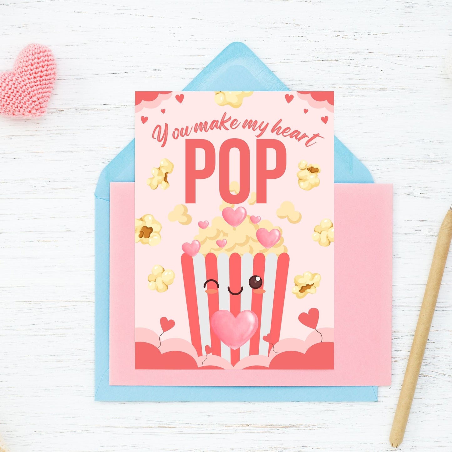 Printable Valentineās Day Greeting Card featuring the phrase āYou Make My Heart Popā with a popcorn theme. Designed as a 5x7 PDF on an 8.5 x 11 sheet with two cards per page. A fun and whimsical Valentineās card for movie and snack lovers.