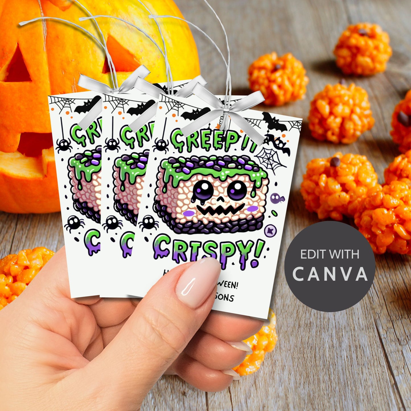 Halloween-themed printable gift tags featuring a spooky rice krispie treat with green frosting and purple sprinkles. The tag reads "Creep It Crispy!" Perfect for Halloween treats, sized 2.5 x 3.5 inches, laid out 8 per sheet. Includes a printable PDF and a link to an editable Canva template.