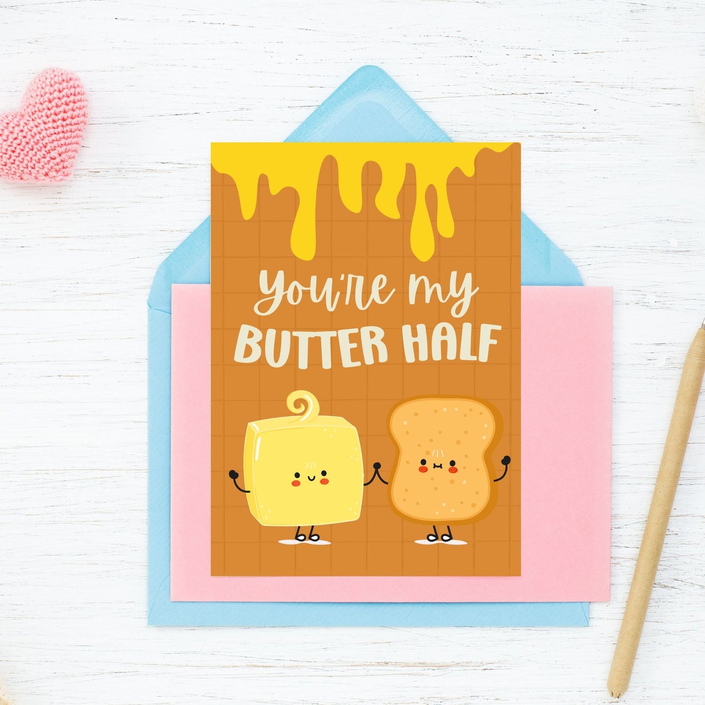 Printable Valentineās Day Greeting Card featuring the phrase āYouāre My Butter Halfā with a cute butter illustration. Designed as a 5x7 PDF on an 8.5 x 11 sheet with two cards per page. A punny and sweet Valentineās card for loved ones.