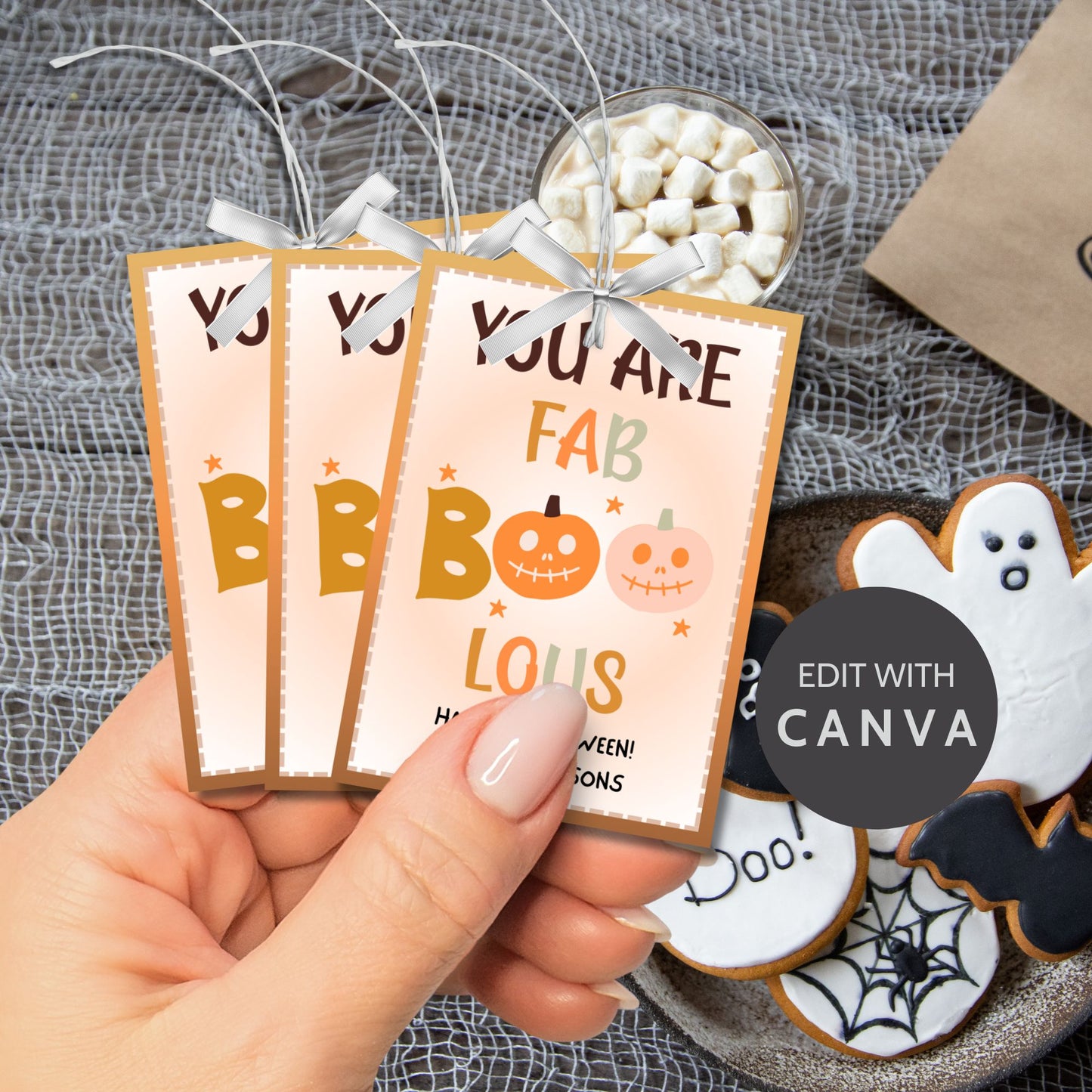 Printable Halloween gift tags with a warm color scheme, featuring the message "You Are FAB-BOO-LOUS" with cute smiling pumpkins, perfect for gifts and party favors.