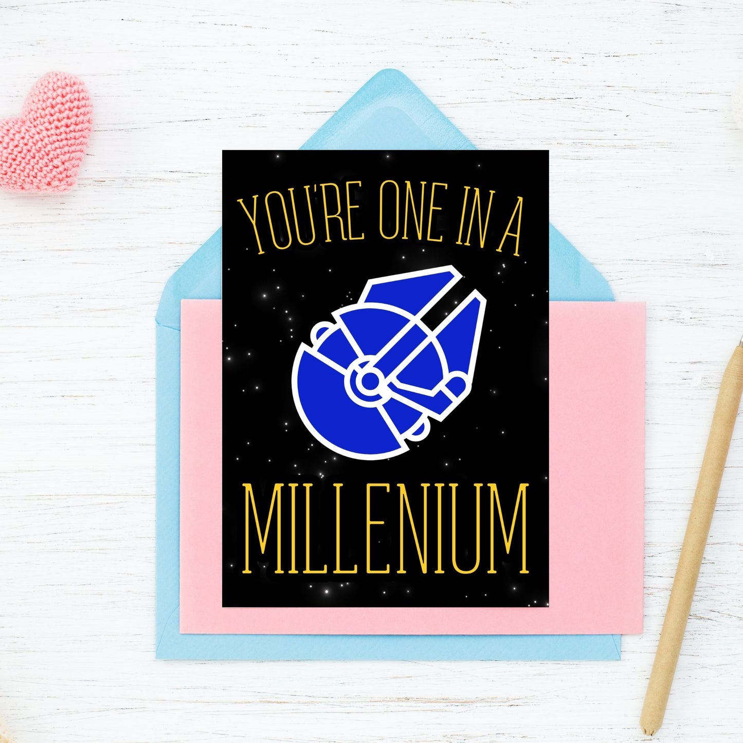 Printable Valentineās Day Greeting Card featuring the pun āYou're One in a Millennium.ā Designed as a 5x7 PDF on an 8.5 x 11 sheet with two cards per page. A perfect Valentineās card for sci-fi and space lovers.