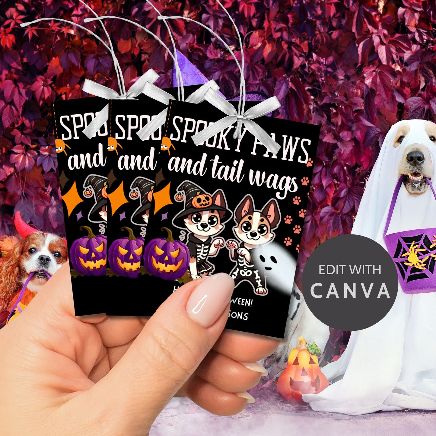 Dog-themed printable Halloween gift tags featuring two dogs in skeleton costumes and pumpkins with the message "Spooky Paws and Tail Wags!" Tags are 2.5 x 3.5 inches, laid out 8 per sheet on an 8.5 x 11-inch page. Includes a printable PDF and a PDF with a link to an editable Canva template.