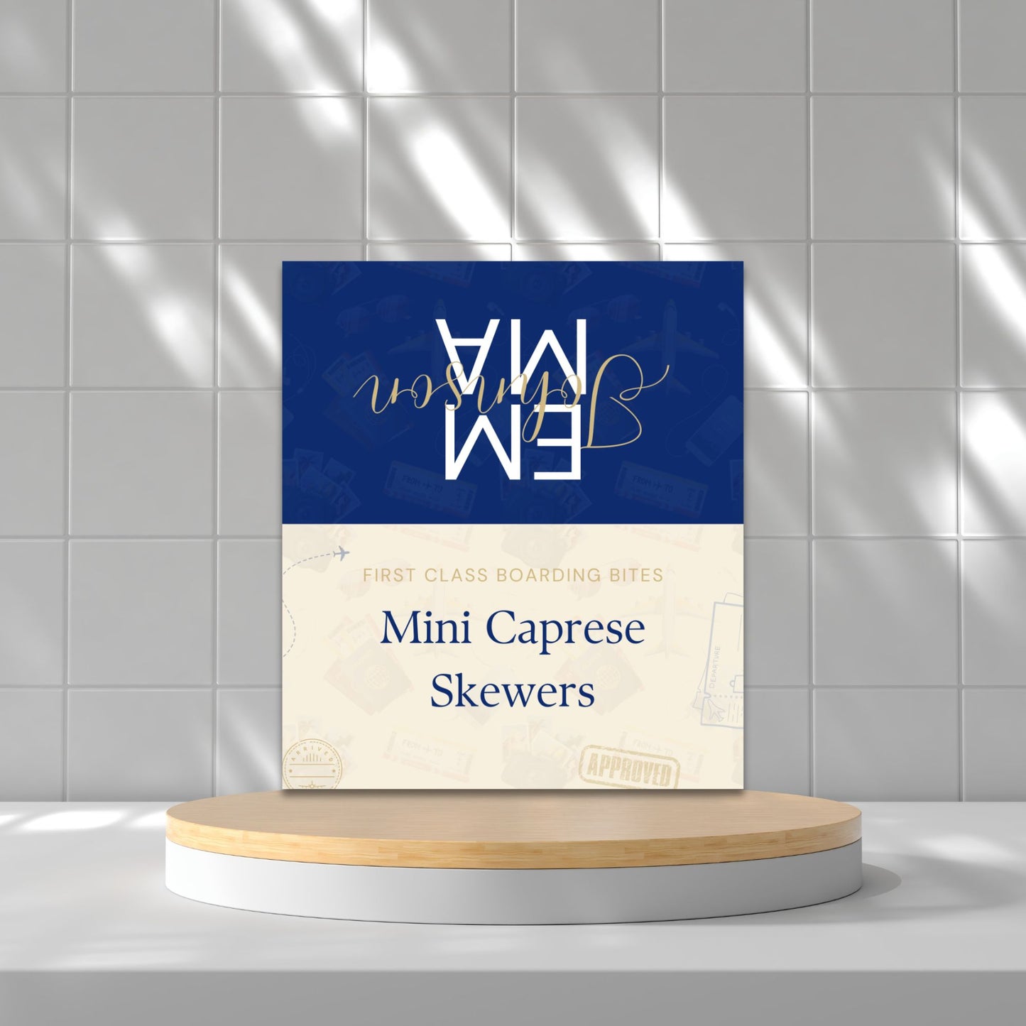Folded editable graduation place card with navy and gold travel-themed "Passport to the Future" design, reading “Mini Caprese Skewers”