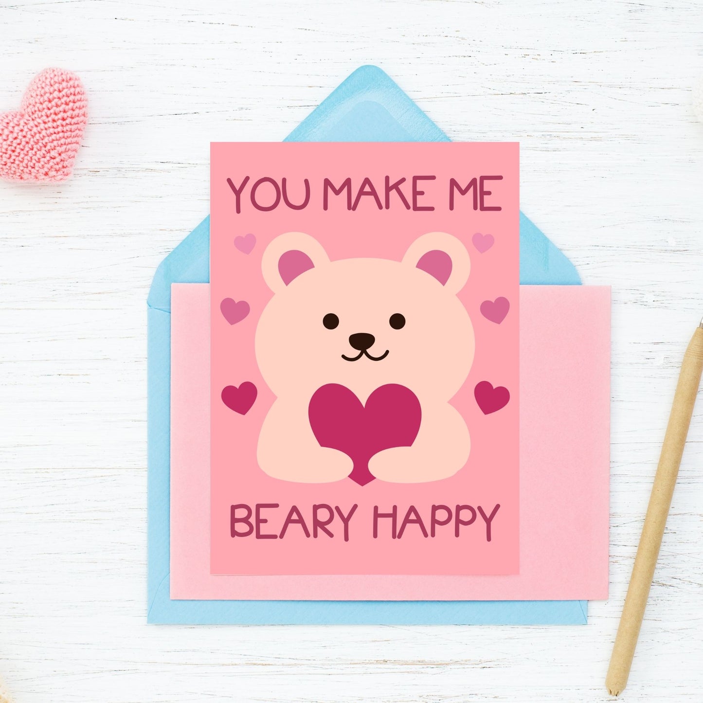 Printable Valentineās Day Greeting Card featuring the pun āYou Make Me Beary Happy.ā Designed as a 5x7 PDF on an 8.5 x 11 sheet with two cards per page. A cute and heartfelt Valentineās card for loved ones.