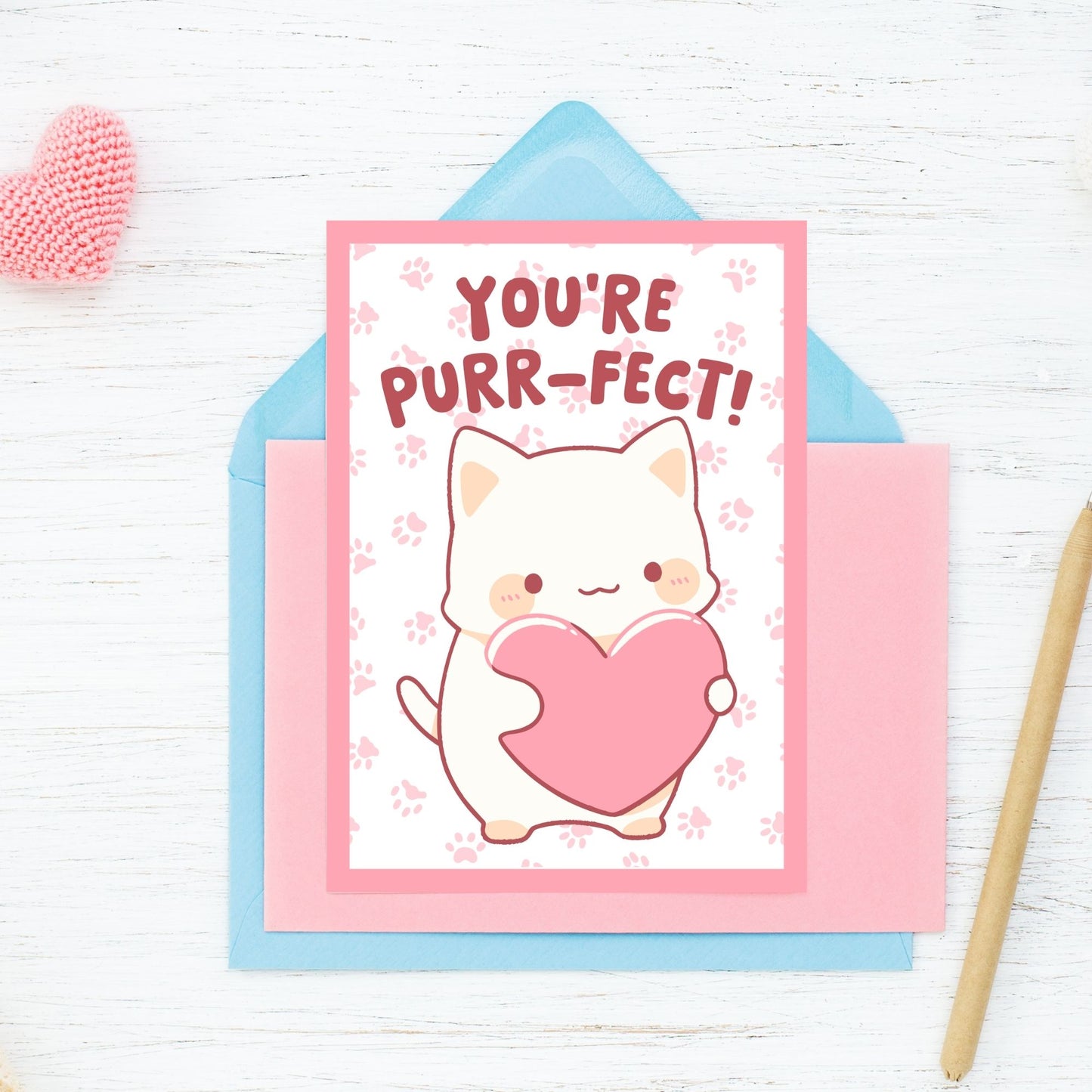 Printable Valentineās Day Greeting Card featuring the phrase āYou're Purrfect.ā Designed as a 5x7 PDF on an 8.5 x 11 sheet with two cards per page. A cute and fun Valentineās card for cat lovers.