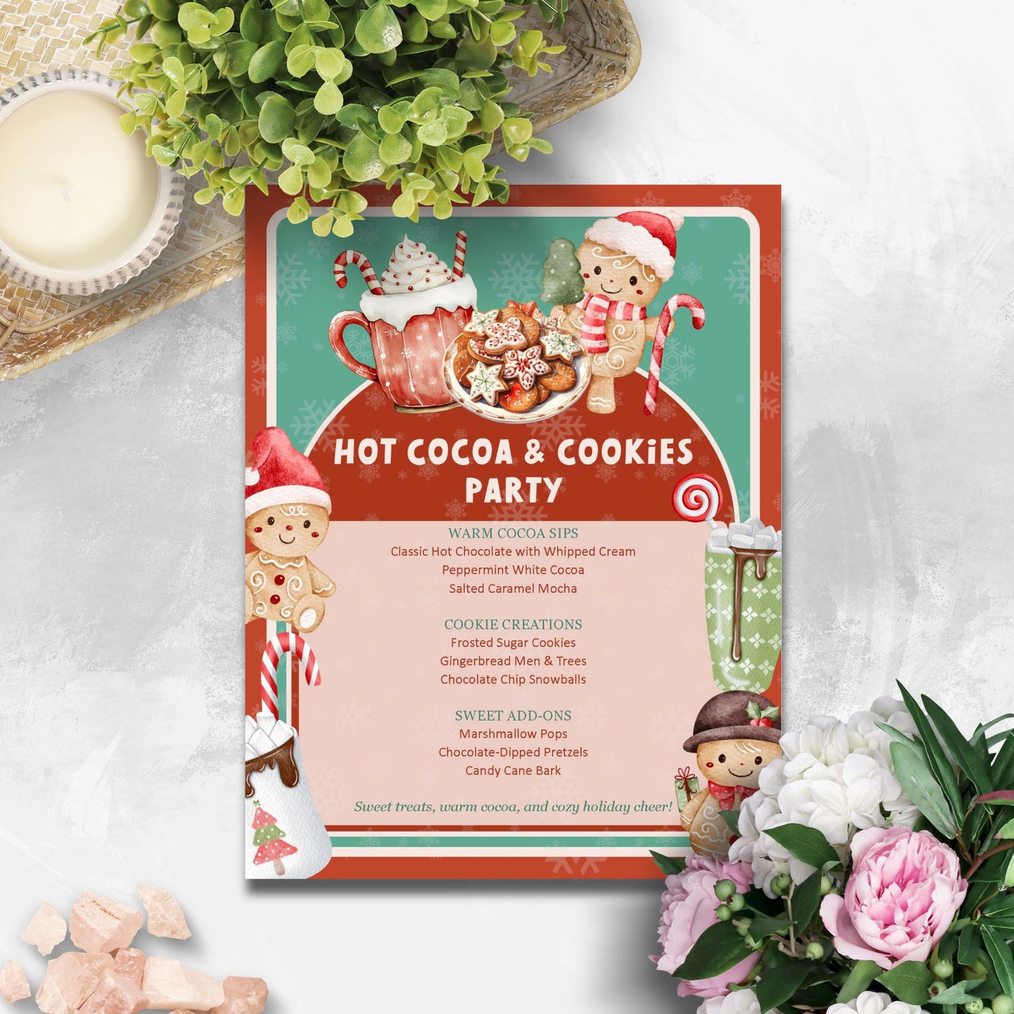 Invitation card for a 'Hot Cocoa & Cookies Party' with gingerbread men and hot cocoa graphics on a white surface with flowers.