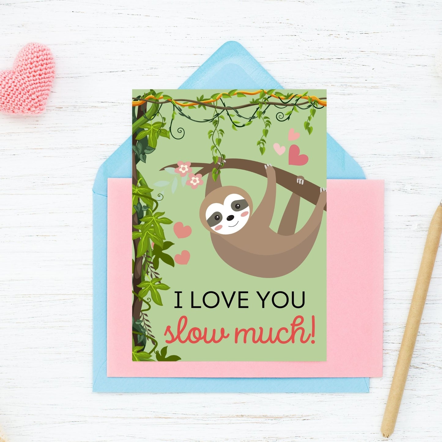 Printable Valentineās Day Greeting Card featuring the pun āI Love You Slow Much.ā Designed as a 5x7 PDF on an 8.5 x 11 sheet with two cards per page. A cute and funny Valentineās card for nature and sloth lovers.