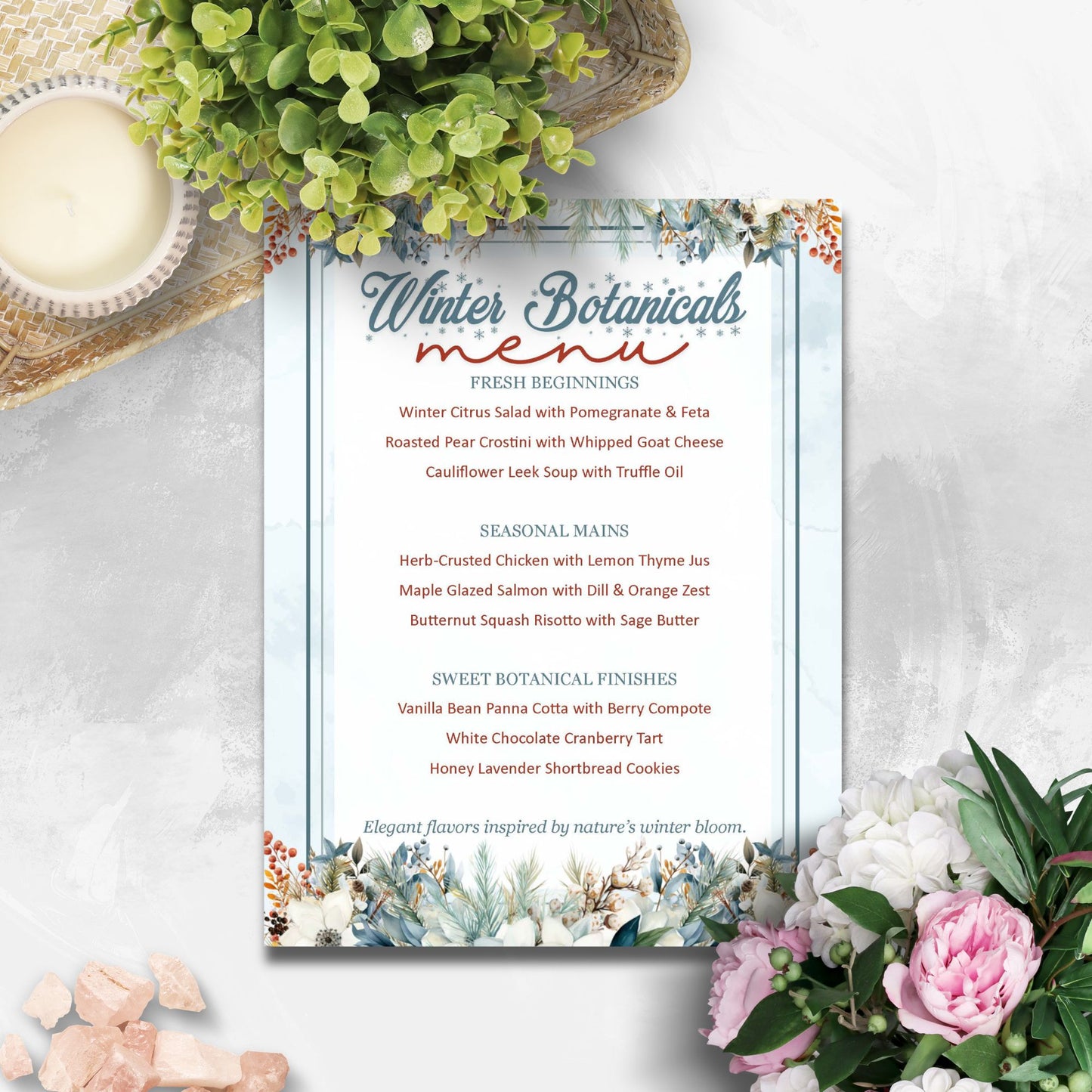 Winter Botanicals menu with floral design on a white surface with flowers and a candle.