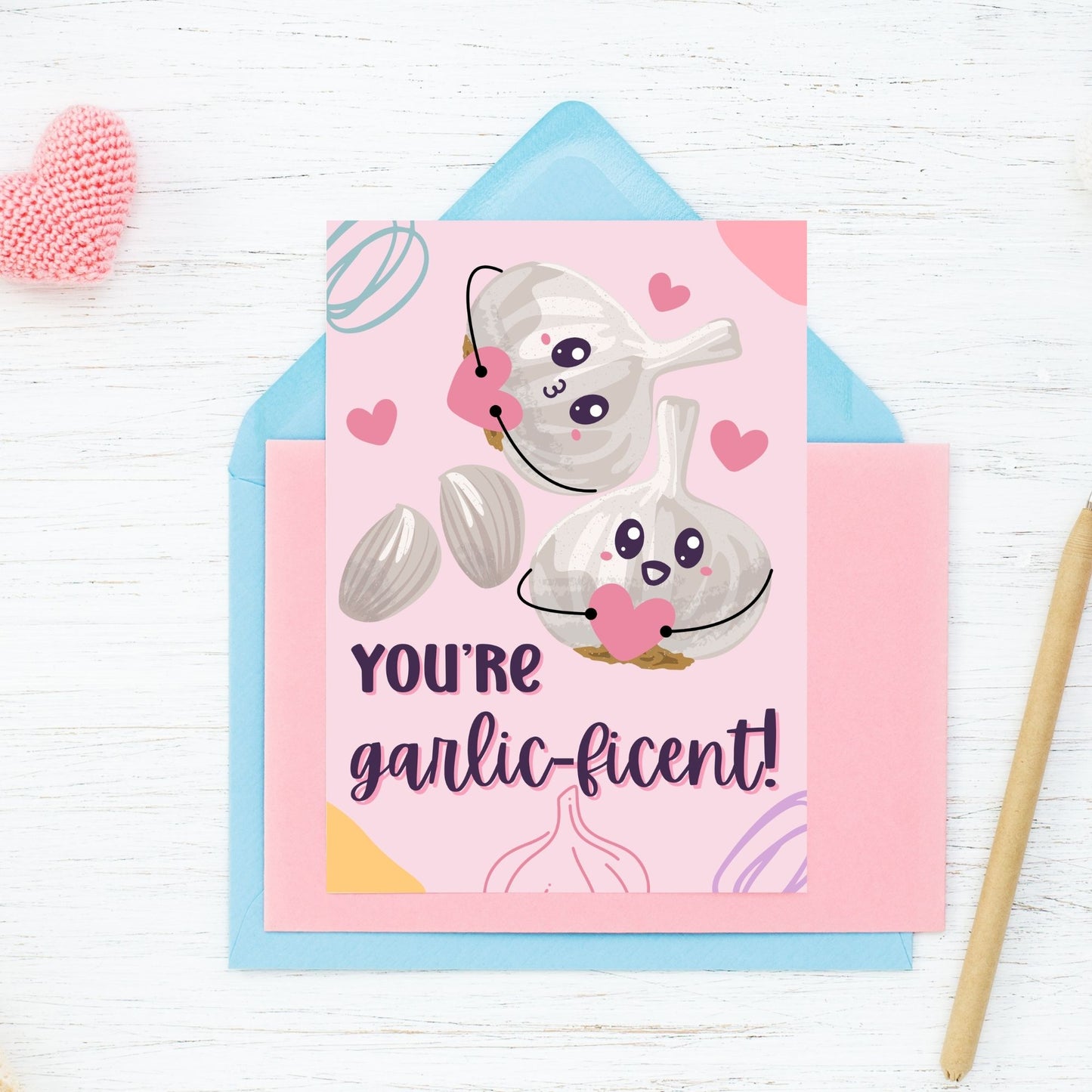 Printable Valentine’s Day Greeting Card featuring the phrase “You’re Garlicficent” with a cute garlic design. Designed as a 5x7 PDF on an 8.5 x 11 sheet with two cards per page. A punny and flavorful Valentine’s card for loved ones.