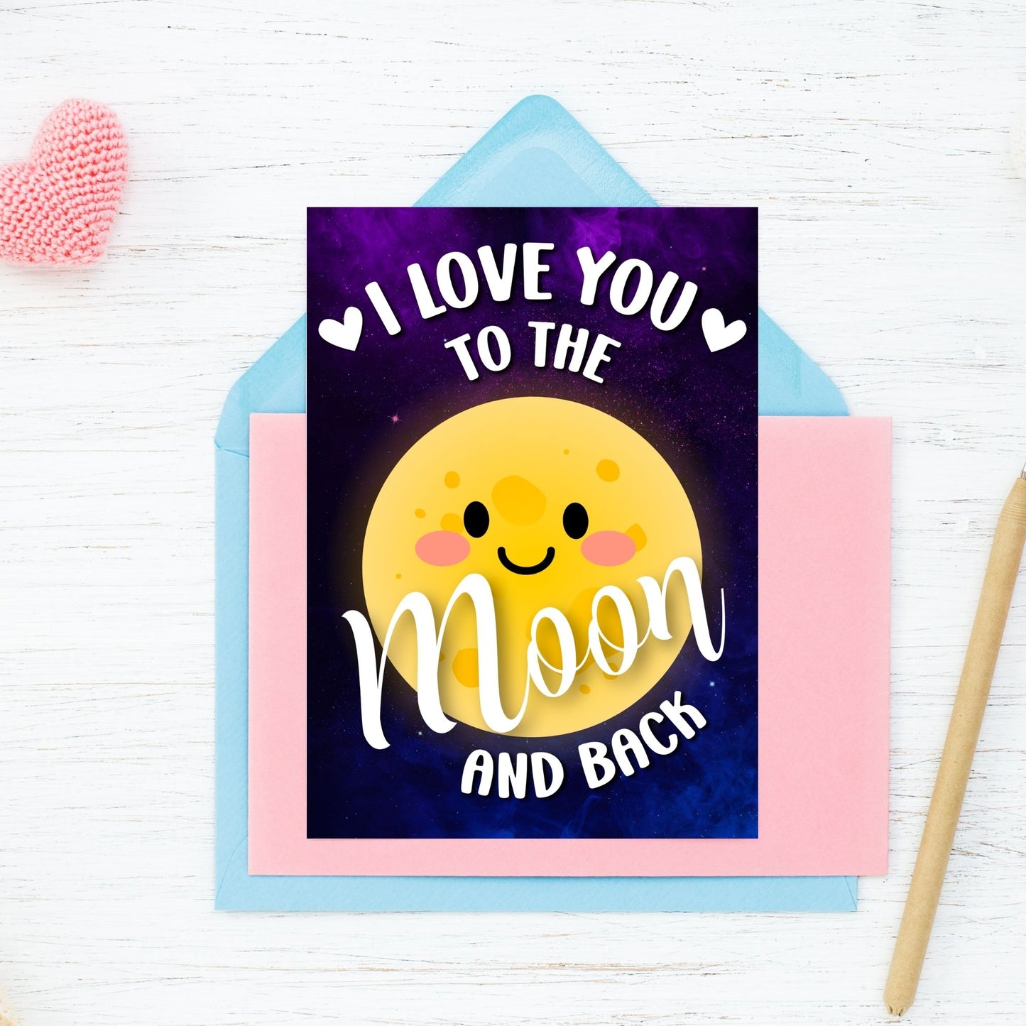 Printable Valentineās Day Greeting Card featuring the message āI Love You to the Moon and Back.ā Designed as a 5x7 PDF on an 8.5 x 11 sheet with two cards per page. A romantic and heartfelt Valentineās card.