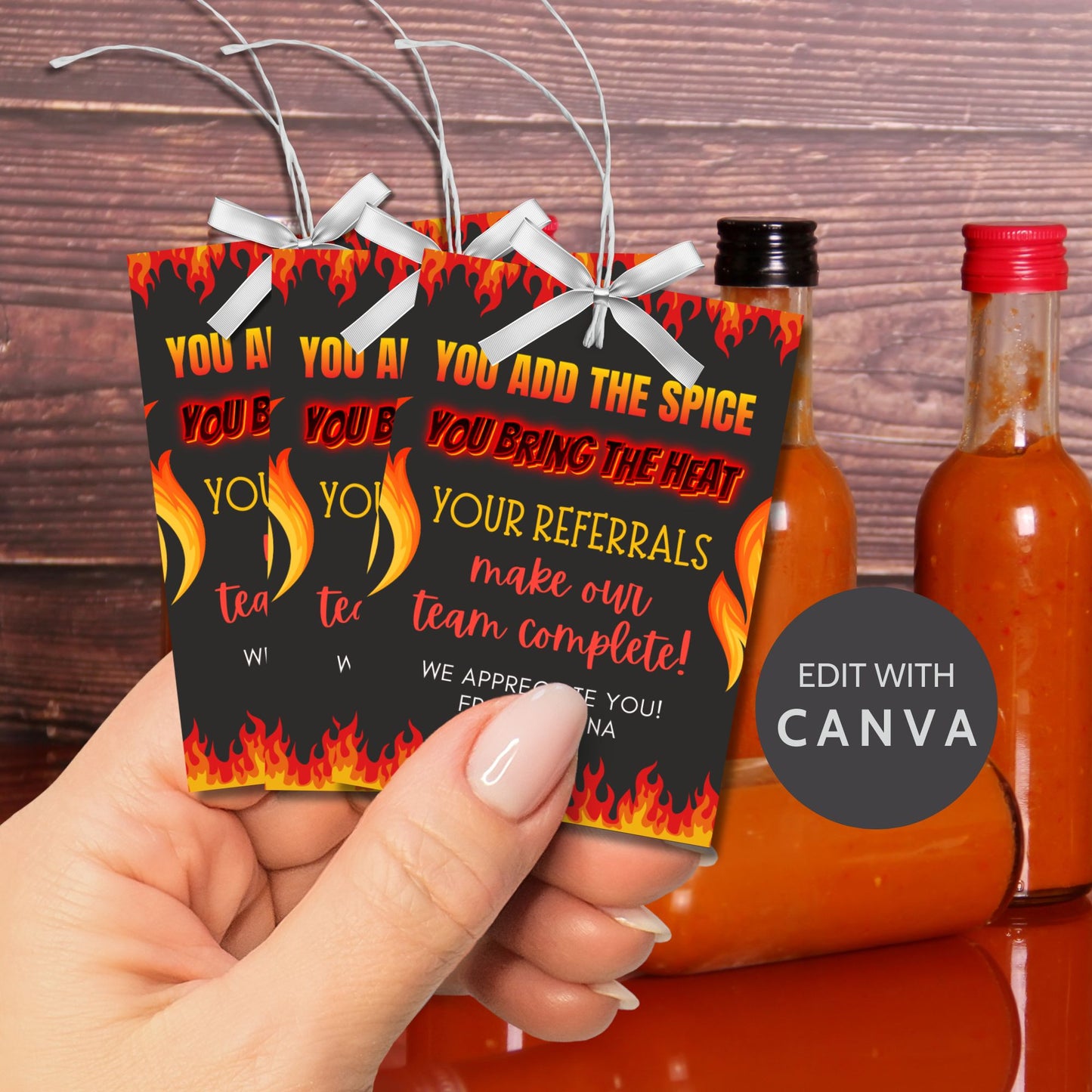 A printable PDF of hot sauce-themed referral gift tags, titled "You Add the Spice, You Bring the Heat," customizable in Canva.