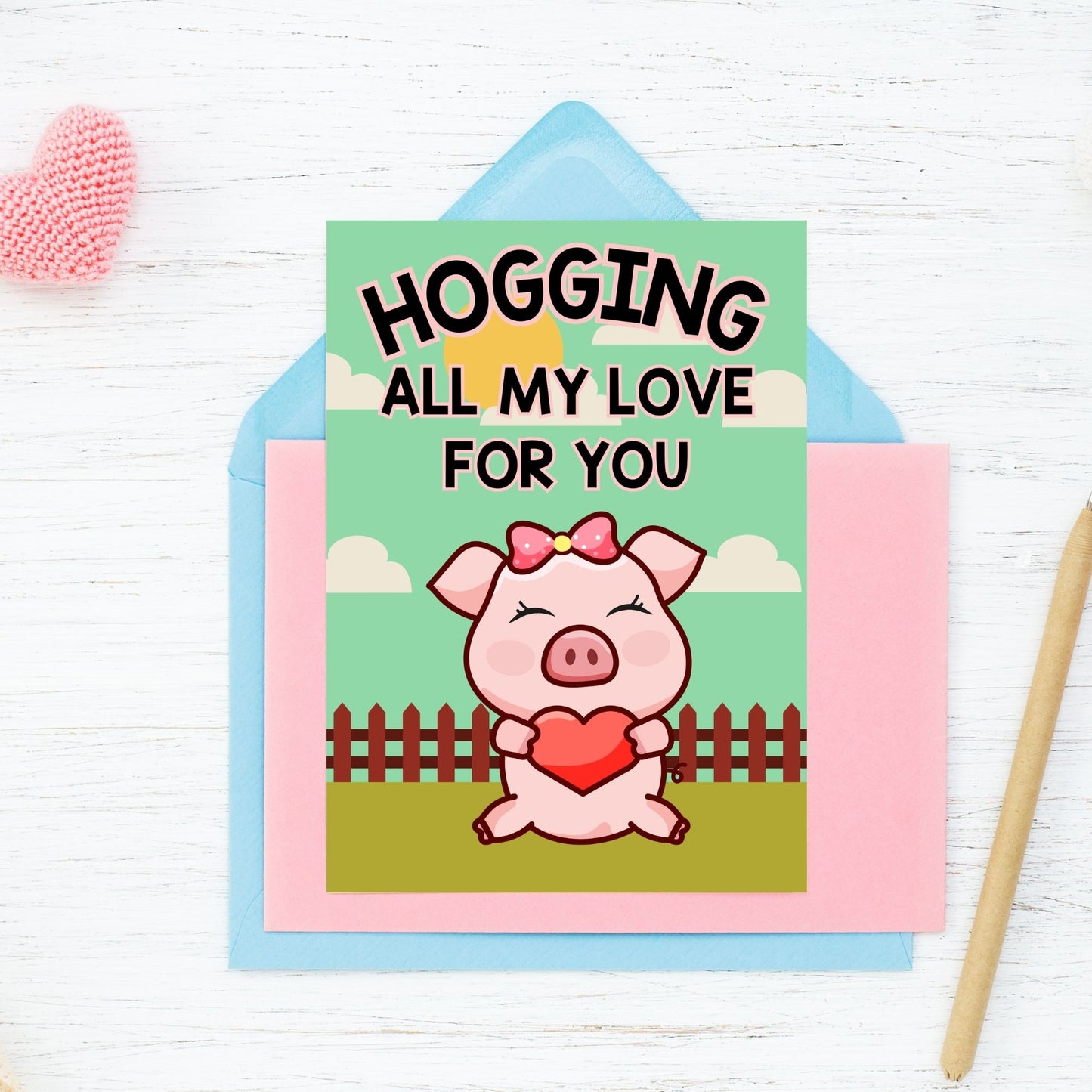 Printable Valentine’s Day Greeting Card featuring the phrase “Hogging All My Love for You” with a pig theme. Designed as a 5x7 PDF on an 8.5 x 11 sheet with two cards per page. A fun and playful Valentine’s card for animal lovers.