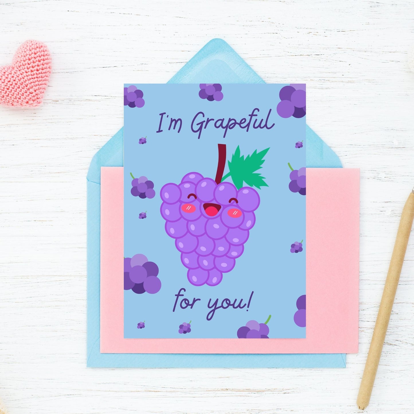 Printable Valentineās Day Greeting Card featuring the phrase āIām Grapeful for Youā with a grape theme. Designed as a 5x7 PDF on an 8.5 x 11 sheet with two cards per page. A sweet and punny Valentineās card for loved ones.