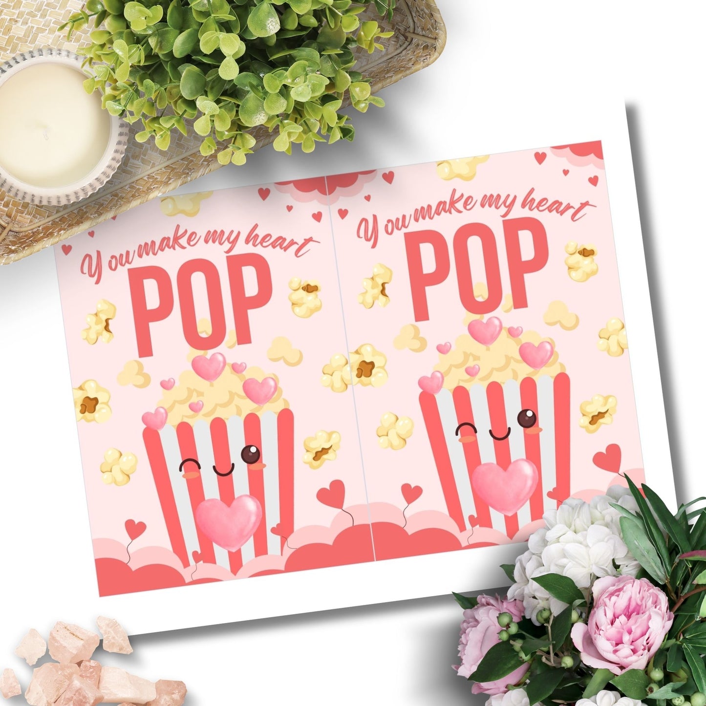 Printable Valentineās Day Greeting Card featuring the phrase āYou Make My Heart Popā with a popcorn theme. Designed as a 5x7 PDF on an 8.5 x 11 sheet with two cards per page. A fun and whimsical Valentineās card for movie and snack lovers.