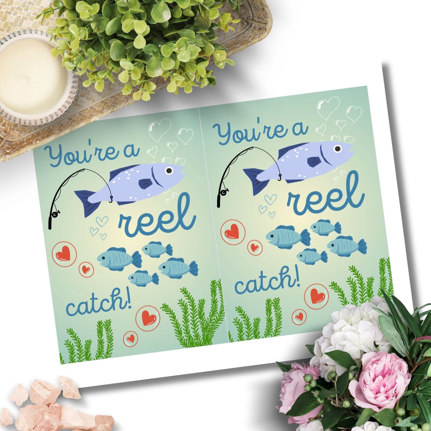 Printable Valentine’s Day Greeting Card with the pun “You're a Reel Catch.” Designed as a 5x7 PDF on an 8.5 x 11 sheet with two cards per page. A fun and punny Valentine’s card for fishing lovers!