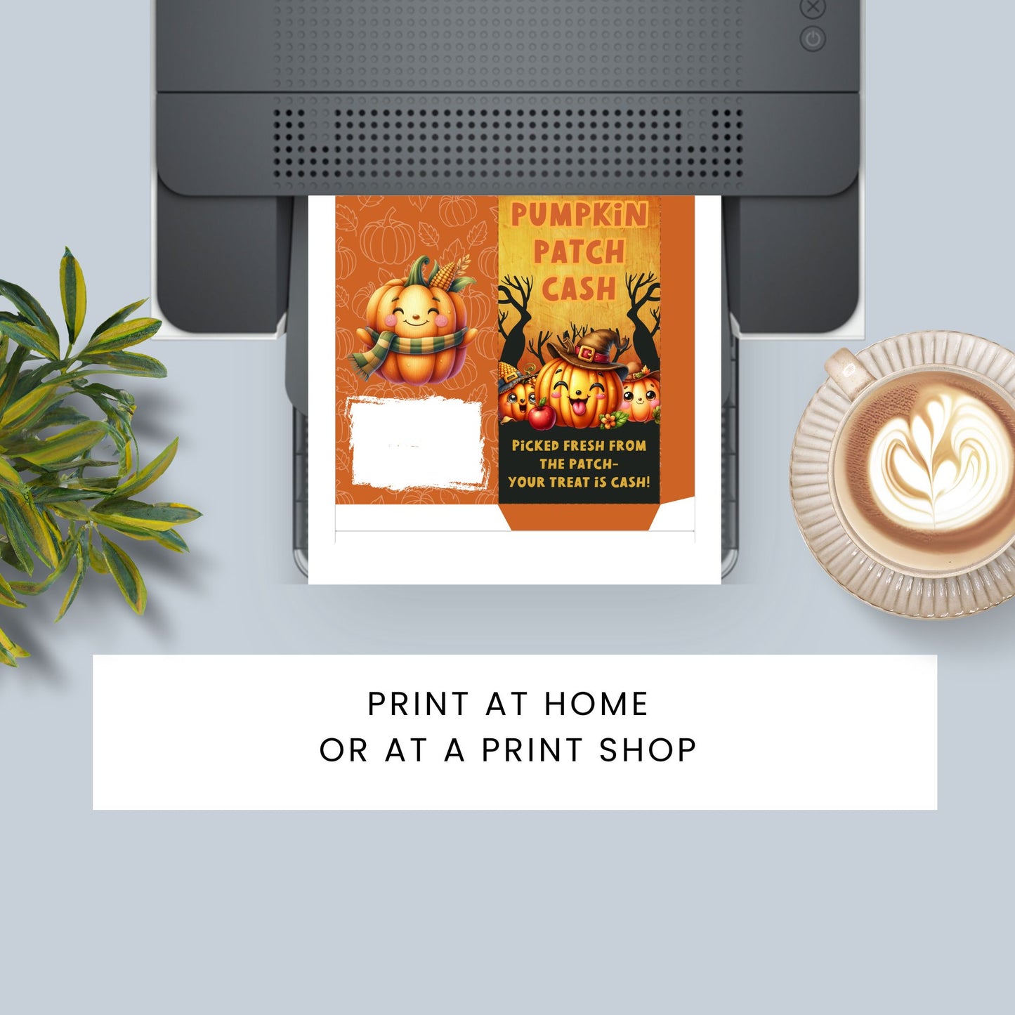 Printer with a printed product featuring pumpkins and text on a light blue background with a plant and coffee cup.