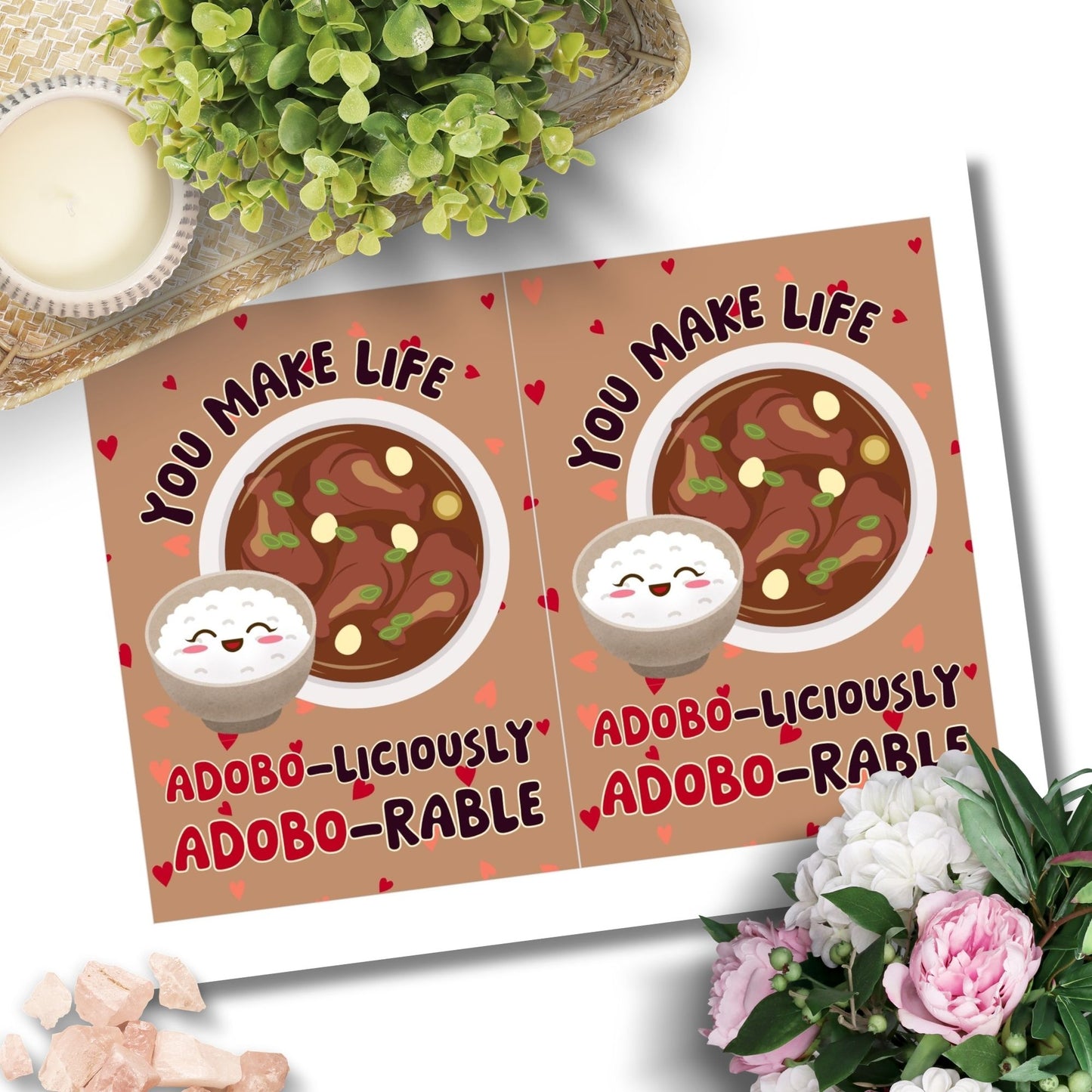 Printable Valentine’s Day card featuring the phrase “You Make Life Adoboliciously Adoborable” with a fun Adobo-themed design. Designed as a 5x7 PDF on an 8.5 x 11 sheet with two cards per page. A punny and heartfelt Valentine’s card for Filipino food lovers.