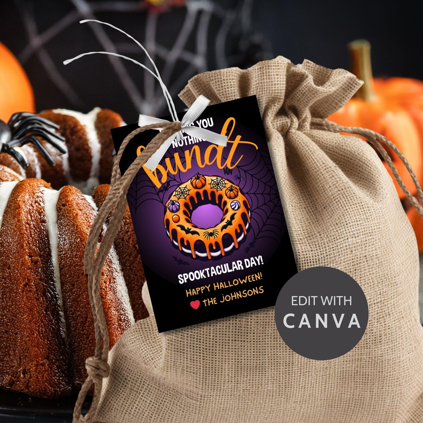 Halloween gift tag featuring a bundt cake decorated with pumpkins and spiderwebs, with the message 'Wishing You Nothing Bundt a Spooktacular Day!'