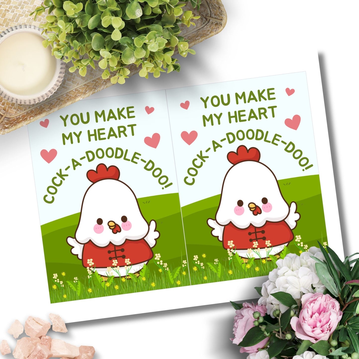 Printable Valentine’s Day Greeting Card featuring the phrase “You Make My Heart Cock-a-doodle-doo” with a rooster theme. Designed as a 5x7 PDF on an 8.5 x 11 sheet with two cards per page. A funny and punny Valentine’s card for loved ones.