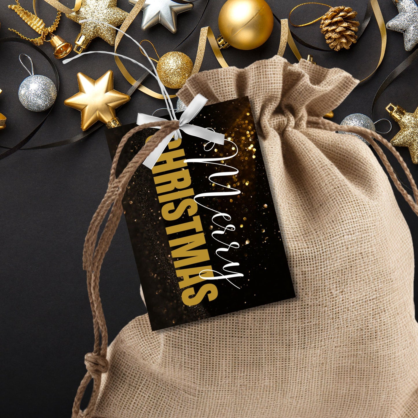 A set of ready-to-print Christmas gift tags with elegant gold and white text on a black background. The "Merry Christmas" message is paired with a sparkling gold design, adding a touch of glamour to holiday gifting. Tags are 2.5 x 3.5 inches in size, perfect for chic and classy gift wrapping.