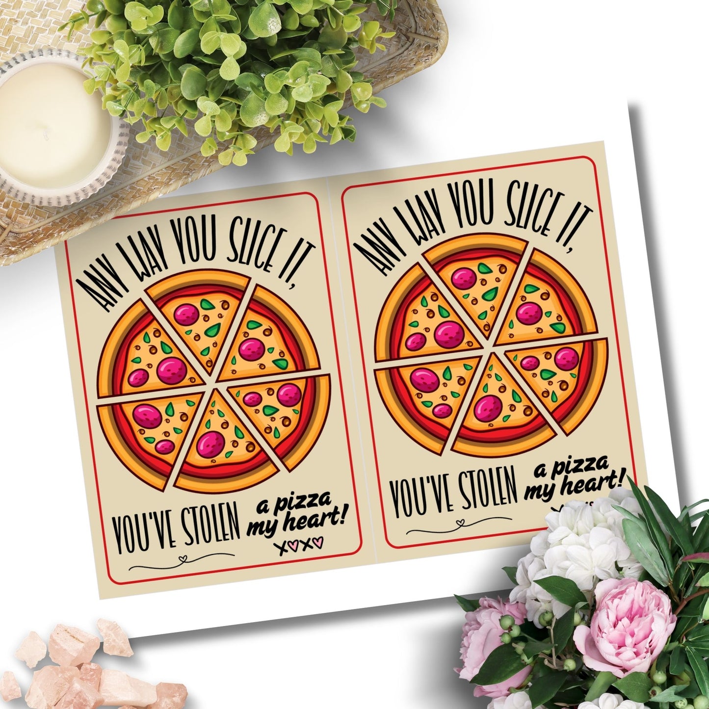 Printable Valentine’s Day Greeting Card with the pun “Any Way You Slice It, You’ve Stolen a Pizza My Heart.” Designed as a 5x7 PDF on an 8.5 x 11 sheet with two cards per page. A perfect punny Valentine’s card for pizza lovers!