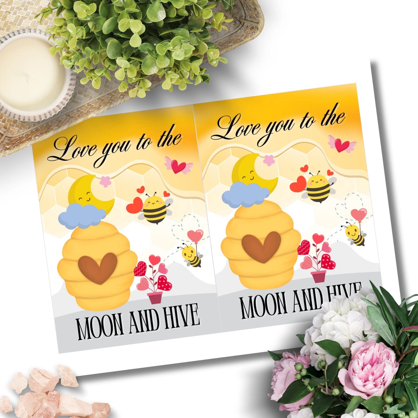 Printable Valentineās Day card featuring the phrase āLove You to the Moon and Hiveā with a bee and moon design. Designed as a 5x7 PDF on an 8.5 x 11 sheet with two cards per page. A punny and heartfelt Valentineās card for loved ones.