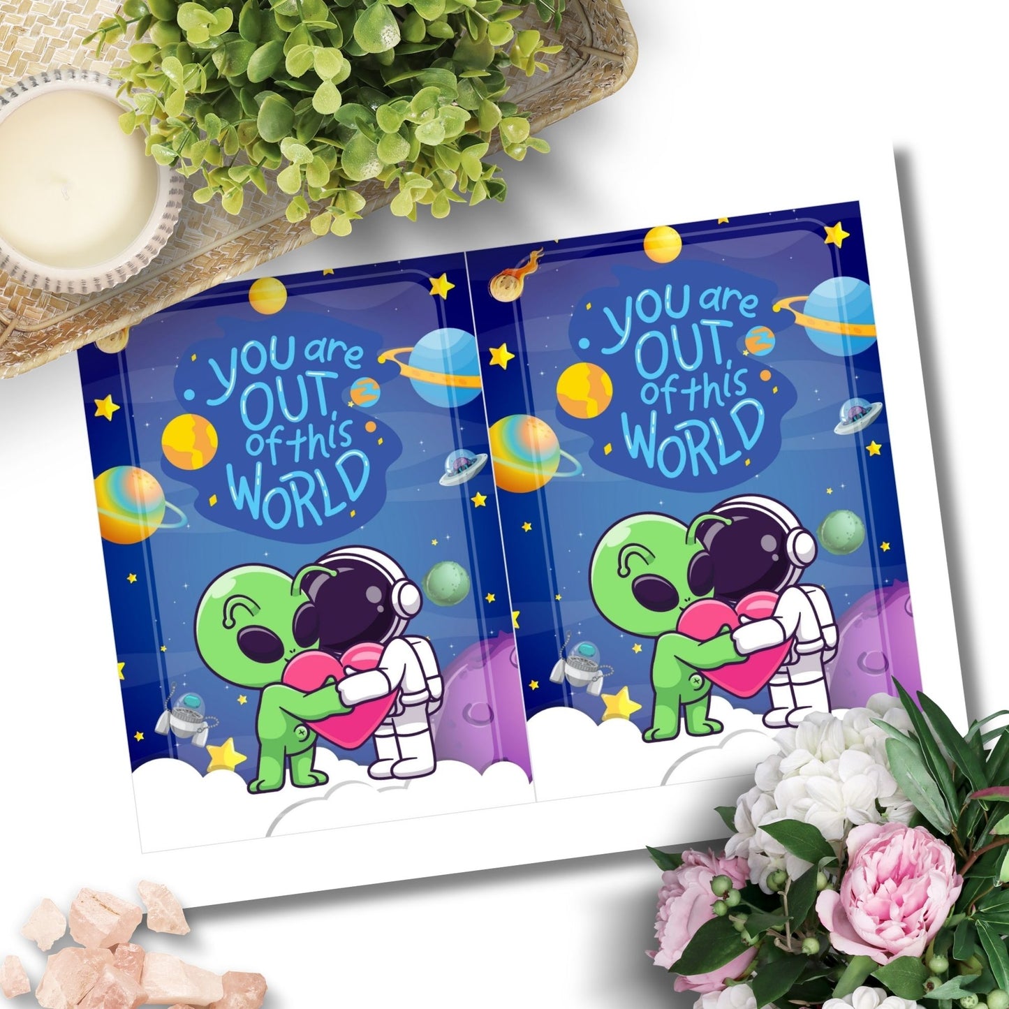 Printable Valentineās Day Greeting Card featuring the phrase āYou Are Out of This World.ā Designed as a 5x7 PDF on an 8.5 x 11 sheet with two cards per page. A cosmic and fun Valentineās card for space lovers.