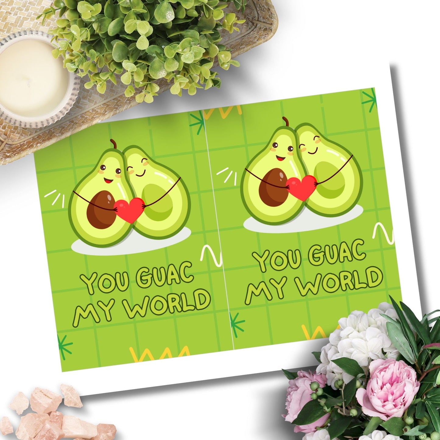 Printable Valentine’s Day Greeting Card featuring the phrase “You Guac My World” with an avocado theme. Designed as a 5x7 PDF on an 8.5 x 11 sheet with two cards per page. A fun and punny Valentine’s card for avocado and guacamole lovers.