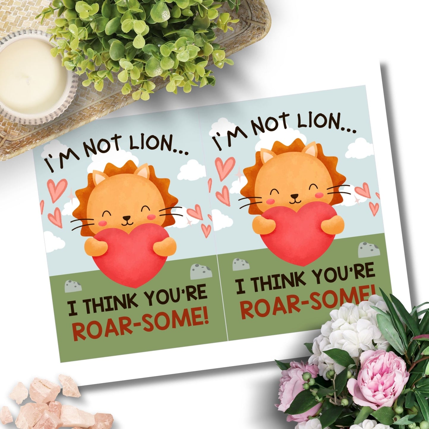 Printable Valentineās Day Greeting Card featuring the pun āIām Not Lion, I Think Youāre Roarsomeā with a lion theme. Designed as a 5x7 PDF on an 8.5 x 11 sheet with two cards per page. A fun and bold Valentineās card for animal lovers.