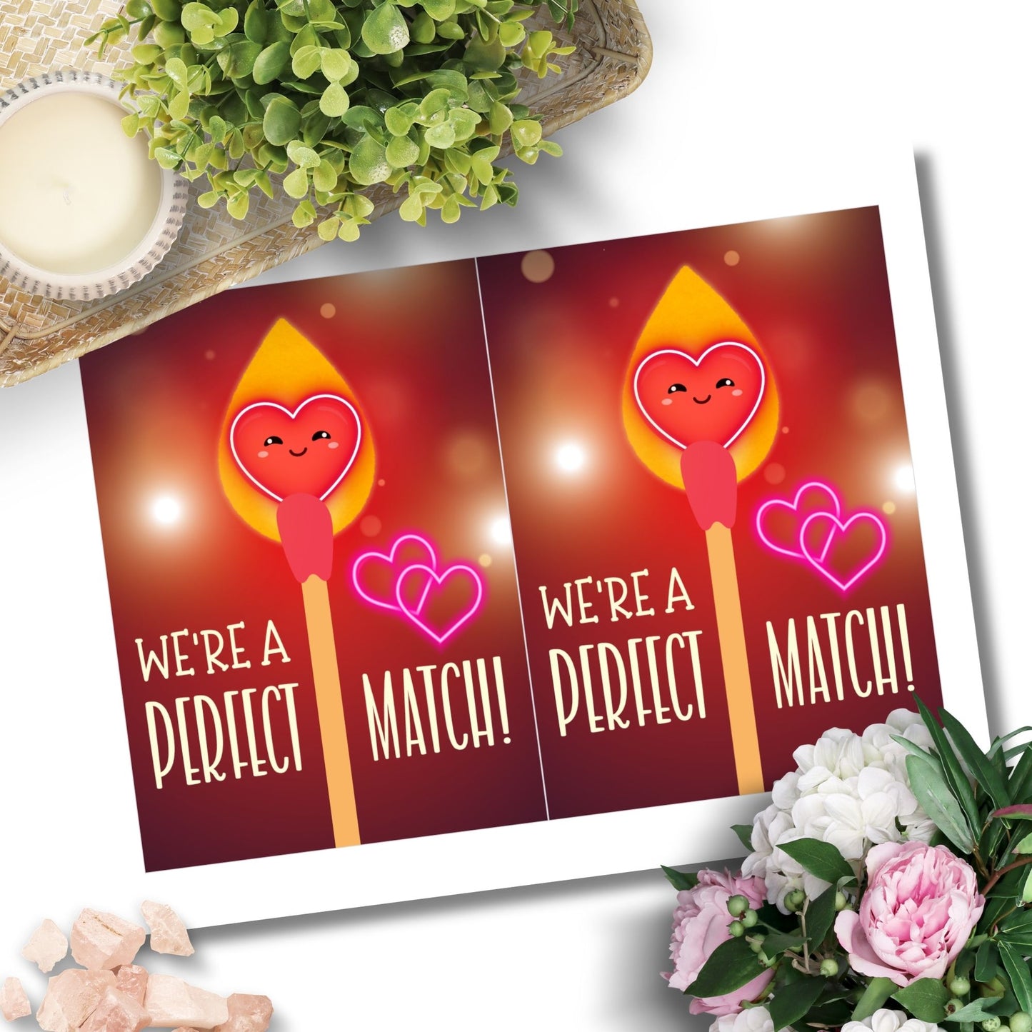 Printable Valentineās Day Greeting Card featuring the phrase āWe're a Perfect Match.ā Designed as a 5x7 PDF on an 8.5 x 11 sheet with two cards per page. A romantic and heartfelt Valentineās card for couples and loved ones.