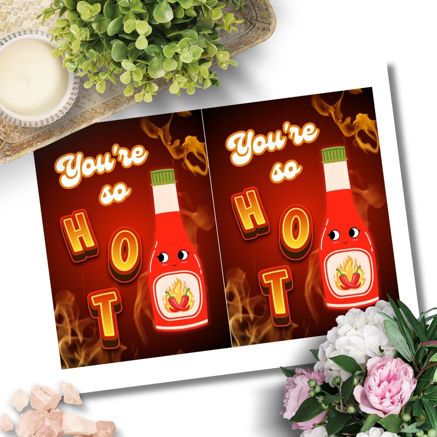 Printable Valentineās Day Greeting Card with the message āYou're So Hot.ā Designed as a 5x7 PDF on an 8.5 x 11 sheet with two cards per page. A fun and flirty Valentineās card for couples.