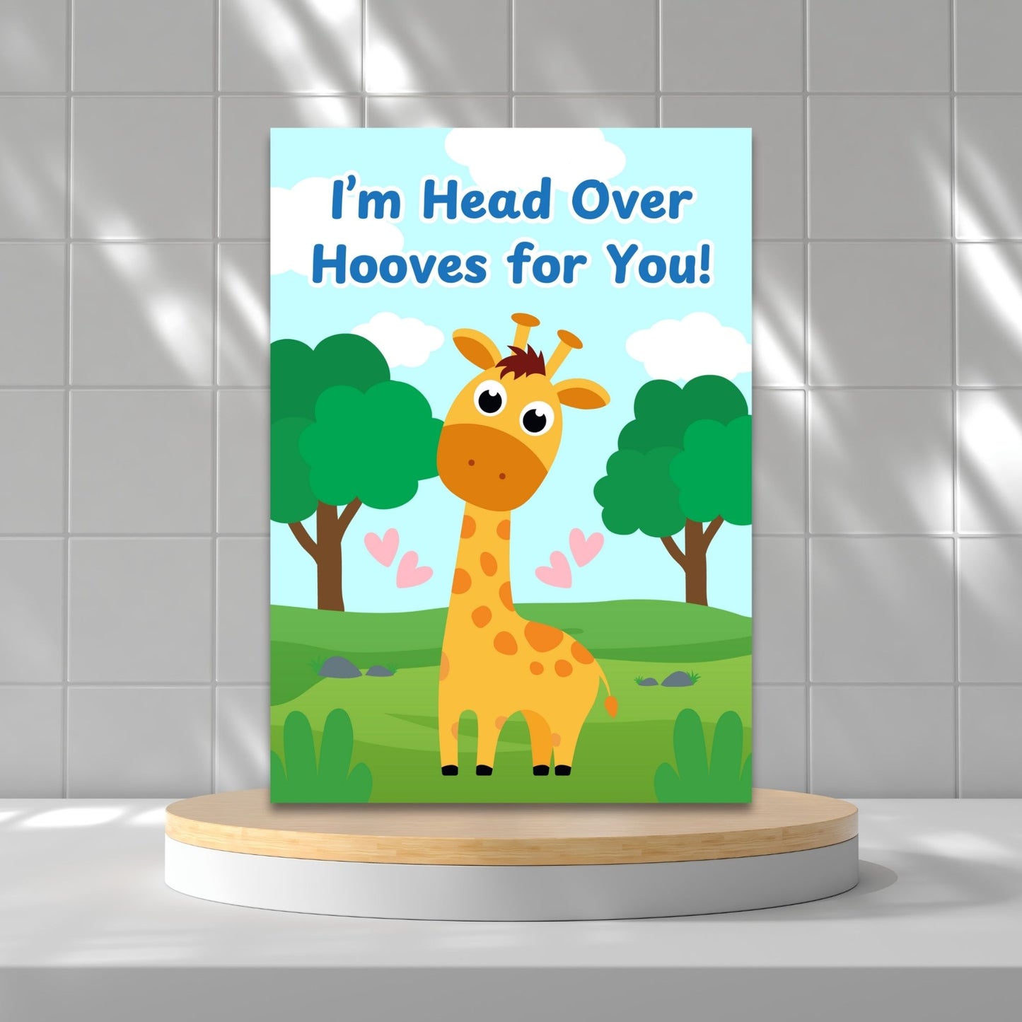 Printable Valentine’s Day Greeting Card featuring the phrase “I’m Head Over Hooves for You” with a giraffe theme. Designed as a 5x7 PDF on an 8.5 x 11 sheet with two cards per page. A sweet and punny Valentine’s card for giraffe lovers and friends.