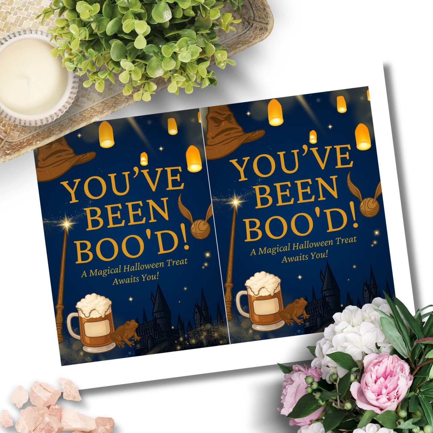 Two 'You've Been Boo'd!' Halloween cards on a white surface with decorative elements.