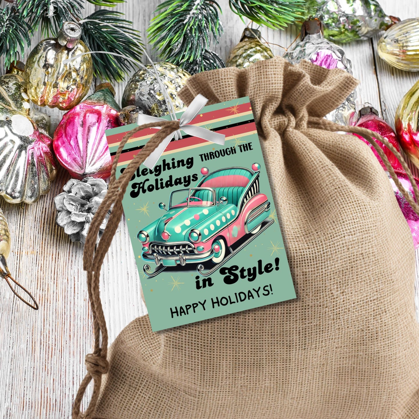 Retro-inspired Christmas gift tags featuring a vintage car with holiday decorations and the message "Sleighing Through the Holidays in Style!" These printable and editable tags add a nostalgic, stylish touch to holiday gifts.