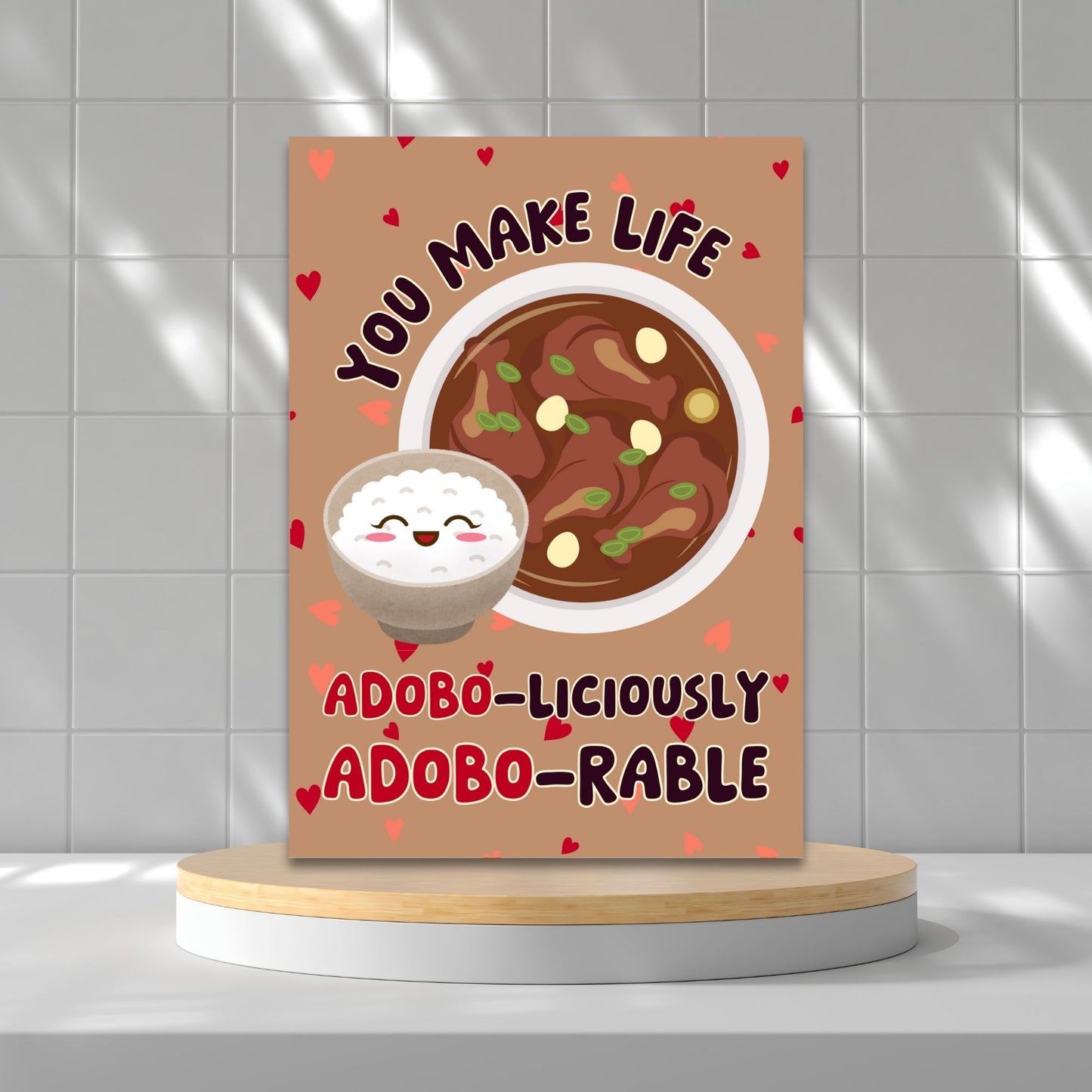 Printable Valentine’s Day card featuring the phrase “You Make Life Adoboliciously Adoborable” with a fun Adobo-themed design. Designed as a 5x7 PDF on an 8.5 x 11 sheet with two cards per page. A punny and heartfelt Valentine’s card for Filipino food lovers.