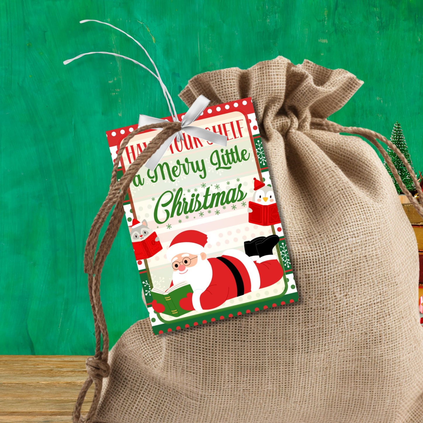 Holiday gift tags with a "Have Your-Shelf a Merry Little Christmas" theme, perfect for pairing with book gifts, featuring Santa reading a book and festive stockings.