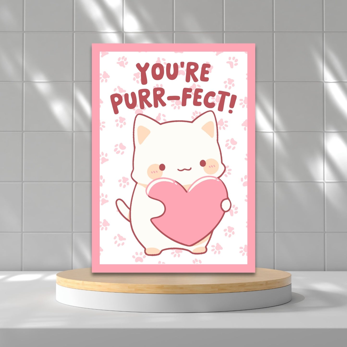 Printable Valentineās Day Greeting Card featuring the phrase āYou're Purrfect.ā Designed as a 5x7 PDF on an 8.5 x 11 sheet with two cards per page. A cute and fun Valentineās card for cat lovers.