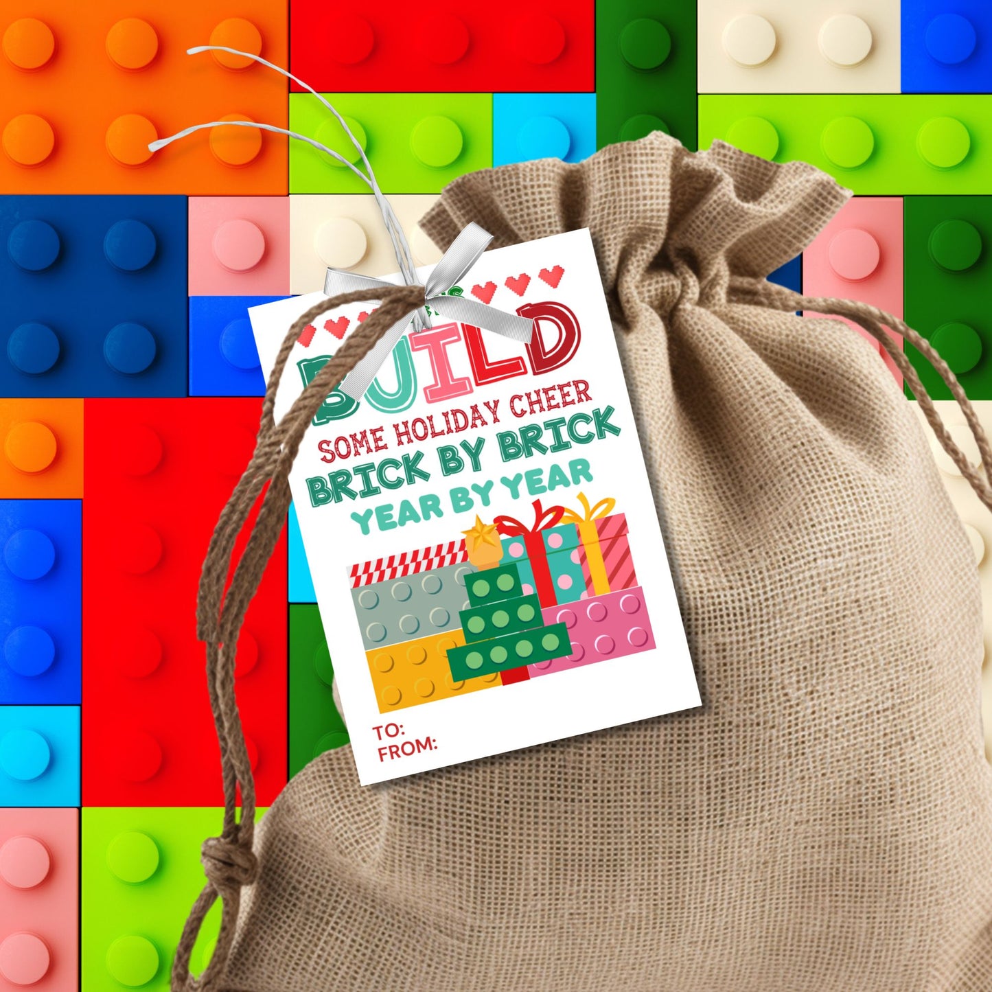 Festive "Let’s Build Some Holiday Cheer" gift tags with a building block theme, perfect for LEGO or similar gifts. Includes printable PDF and editable Canva template for personalization.